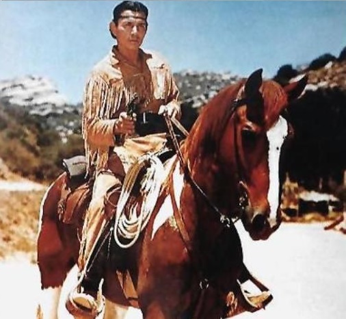 Jay Silverheels riding horse in the set of The Lone Ranger.